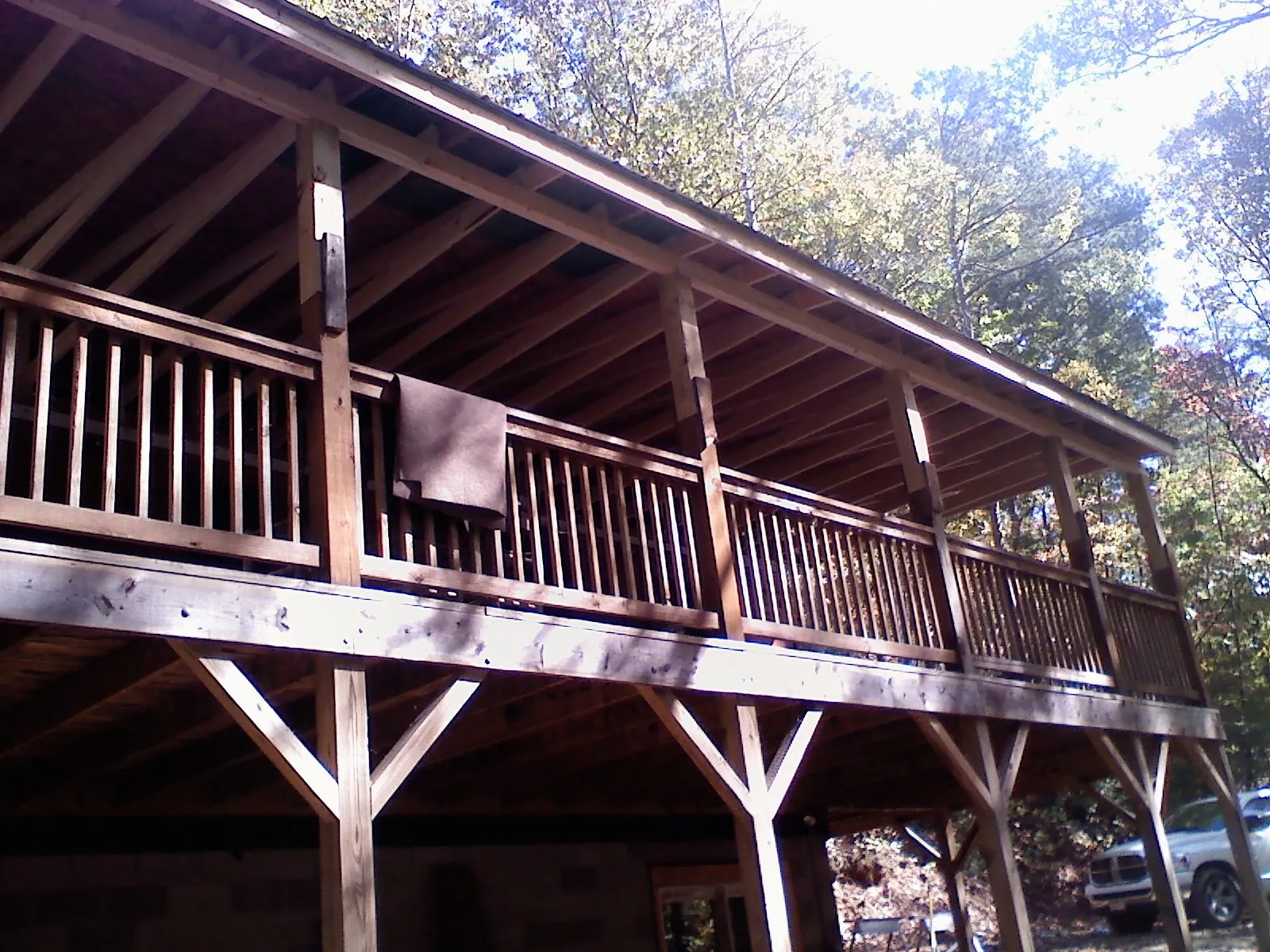 Timber framing under a new elevated porch and deck — Roof Leak Repair in Colona by Roofing Brothers